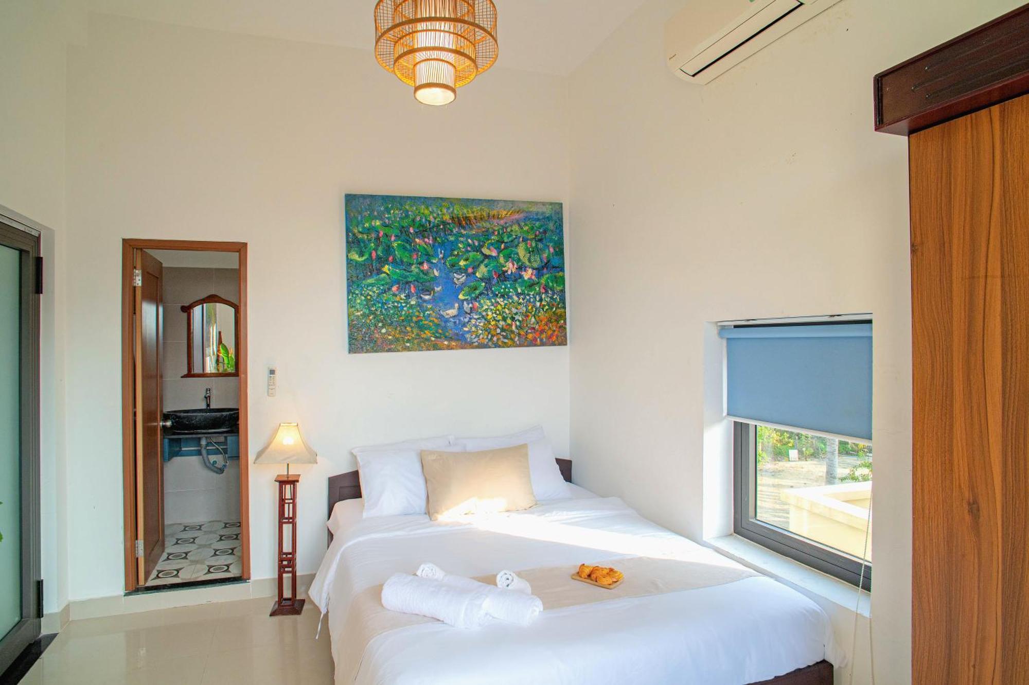 Romitto Riverside In Pool अपार्टमेंट Hoi An