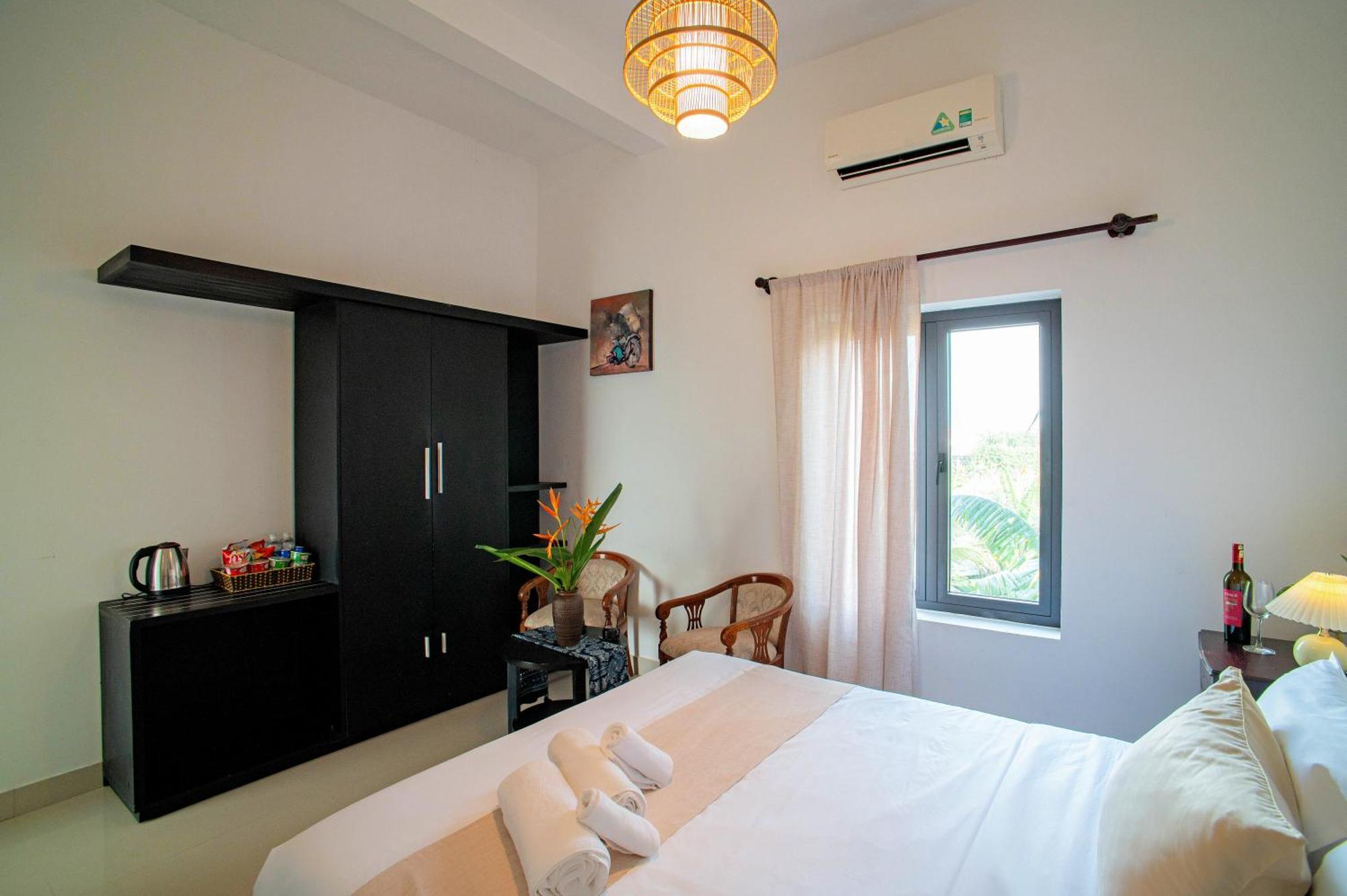 Romitto Riverside In Pool अपार्टमेंट Hoi An